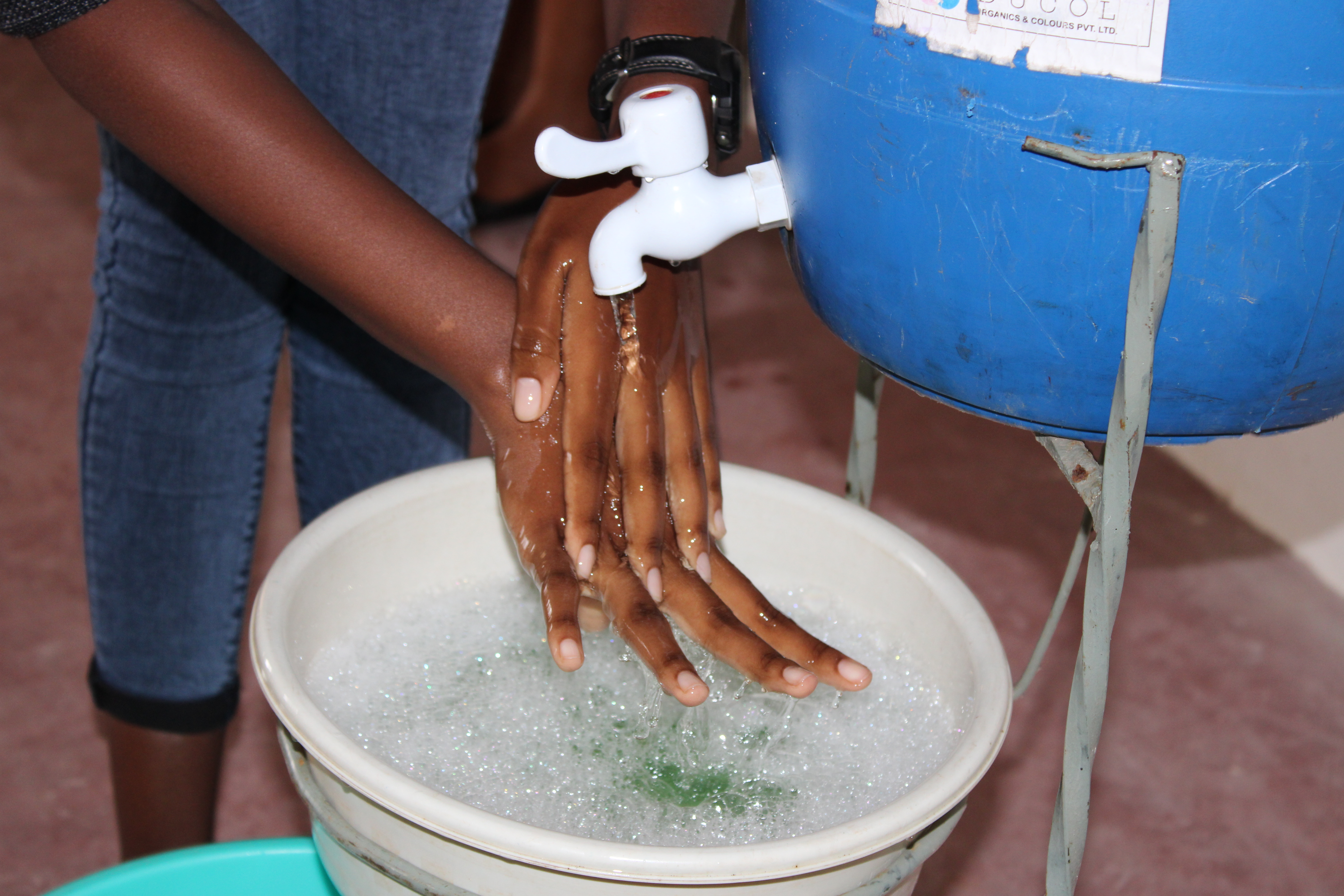 students washing hands